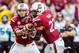 Brendan Nosovitch (left) hands off to Brandon Wilds against Coastal Carolina.