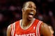 Jan 13, 2014; Boston, MA, USA; Houston Rockets power forward Dwight Howard (12) has a laugh with teammates during the first quarter of their 104-92 win over the Boston Celtics at TD Garden. Mandatory Credit: Winslow Townson-USA TODAY Sports