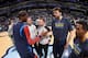 MEMPHIS, TN - JANUARY 14: Marc Gasol #33 and Mike Conley #11 of the Memphis Grizzlies greet Kevin Durant #35 of the Oklahoma City Thunder before a game on January 14, 2014 at FedExForum in Memphis, Tennessee. NOTE TO USER: User expressly acknowledges and agrees that, by downloading and or using this photograph, User is consenting to the terms and conditions of the Getty Images License Agreement. Mandatory Copyright Notice: Copyright 2014 NBAE (Photo by Joe Murphy/NBAE via Getty Images)