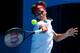 MELBOURNE, AUSTRALIA - JANUARY 14: Roger Federer of Switzerland plays a forehand in his first round match against James Duckworth of Australia during day two of the 2014 Australian Open at Melbourne Park on January 14, 2014 in Melbourne, Australia. (Photo by Scott Barbour/Getty Images)