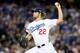 LOS ANGELES, CA - OCTOBER 07: Starting pitcher Clayton Kershaw #22 of the Los Angeles Dodgers pitches in the first inning against the Atlanta Braves in Game Four of the National League Division Series at Dodger Stadium on October 7, 2013 in Los Angeles, California. (Photo by Stephen Dunn/Getty Images)