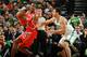 BOSTON, MA - JANUARY 13: Dwight Howard #12 of the Houston Rockets holds the ball against Kris Humphries #43 of the Boston Celtics on January 13, 2014 at the TD Garden in Boston, Massachusetts. NOTE TO USER: User expressly acknowledges and agrees that, by downloading and or using this photograph, User is consenting to the terms and conditions of the Getty Images License Agreement. Mandatory Copyright Notice: Copyright 2014 NBAE (Photo by Brian Babineau/NBAE via Getty Images)