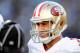 CHARLOTTE, NC - JANUARY 12: Colin Kaepernick #7 of the San Francisco 49ers looks on late in the fourth quarter against the Carolina Panthers during the NFC Divisional Playoff Game at Bank of America Stadium on January 12, 2014 in Charlotte, North Carolina. The 49ers defeated the Panthers 23-10. (Photo by Grant Halverson/Getty Images)