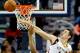 Dec 11, 2013; New Orleans, LA, USA; New Orleans Pelicans center Jason Smith (14) blocks a shot by Detroit Pistons power forward Greg Monroe (10) during the second quarter at New Orleans Arena. Mandatory Credit: Derick E. Hingle-USA TODAY Sports