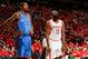 HOUSTON, TX - MAY 3: Kevin Durant #35 of the Oklahoma City Thunder and James Harden #13 of the Houston Rockets wait to resume play in Game Six of the Western Conference Quarterfinals during the 2013 NBA Playoffs on May 3, 2013 at the Toyota Center in Houston, Texas. NOTE TO USER: User expressly acknowledges and agrees that, by downloading and or using this photograph, User is consenting to the terms and conditions of the Getty Images License Agreement. Mandatory Copyright Notice: Copyright 2013 NBAE (Photo by Layne Murdoch/NBAE via Getty Images)