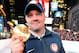 NEW YORK, NY - OCTOBER 29: Bobsledder Steve Holcomb poses with his medal during the USOC 100 Days Out 2014 Sochi Winter Olympics Celebration at Times Square on October 29, 2013 in New York City. (Photo by D Dipasupil/Getty Images for USOC)