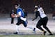 Dec 13, 2013; Charleston, IL, USA; Towson Tigers defensive tackle Jon Desir (99) pursues Eastern Illinois Panthers quarterback Jimmy Garoppolo (10) during the fourth quarter at O'Brien Field. Mandatory Credit: Bradley Leeb-USA TODAY Sports