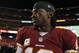 Nov 25, 2013; Landover, MD, USA; Washington Redskins quarterback Robert Griffin III (10) walks off the field after the game against the San Francisco 49ers at FedEx Field. The 49ers won 27-6. Mandatory Credit: Geoff Burke-USA TODAY Sports