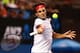 MELBOURNE, AUSTRALIA - JANUARY 16: Roger Federer of Switzerland plays a forehand in his second round match against Blaz Kavcic of Slovenia during day four of the 2014 Australian Open at Melbourne Park on January 16, 2014 in Melbourne, Australia. (Photo by Matt King/Getty Images)