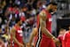 WASHINGTON, DC - JANUARY 15: LeBron James #6 of the Miami Heat walks off the floor during a first quarter timeout against the Washington Wizards at Verizon Center on January 15, 2014 in Washington, DC. NOTE TO USER: User expressly acknowledges and agrees that, by downloading and or using this photograph, User is consenting to the terms and conditions of the Getty Images License Agreement. (Photo by Rob Carr/Getty Images)