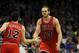 Jan 15, 2014; Orlando, FL, USA; Chicago Bulls center Joakim Noah (13) and shooting guard Kirk Hinrich (12) high five and reacts during double overtime against the Orlando Magic at Amway Center. Chicago Bulls defeated the Orlando Magic 128-125 in triple overtime. Mandatory Credit: Kim Klement-USA TODAY Sports