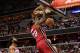 WASHINGTON, DC - JANUARY 15: Greg Oden #20 of the Miami Heat dunks the ball against the Washington Wizards during the first half at Verizon Center on January 15, 2014 in Washington, DC. NOTE TO USER: User expressly acknowledges and agrees that, by downloading and or using this photograph, User is consenting to the terms and conditions of the Getty Images License Agreement. (Photo by Rob Carr/Getty Images)