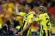 LONDON, ENGLAND - MAY 25: Ilkay Gundogan of Borussia Dortmund (L) celebrates with team-mate Marcel Schmelzer after scoring a goal from the penalty spot during the UEFA Champions League final match between Borussia Dortmund and FC Bayern Muenchen at Wembley Stadium on May 25, 2013 in London, United Kingdom. (Photo by Alex Grimm/Getty Images)
