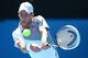 MELBOURNE, AUSTRALIA - JANUARY 15: Novak Djokovic of Serbia plays a backhand in his second round match against Leonardo Mayer of Argentina during day three of the 2014 Australian Open at Melbourne Park on January 15, 2014 in Melbourne, Australia. (Photo by Chris Hyde/Getty Images)