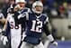 Nov 24, 2013; Foxborough, MA, USA; New England Patriots quarterback Tom Brady (12) reacts after a completed pass against the Denver Broncos during overtime at Gillette Stadium Stadium. Mandatory Credit: Greg M. Cooper-USA TODAY Sports