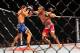 May 18, 2013; Jaragua do Sul, BRAZIL; Luke Rockhold (blue shorts) fights against Vitor Belfort (red shorts) during UFC on FX 8 at ARena Jaragua. Mandatory Credit: Jason da Silva-USA TODAY Sports