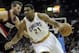 Dec 17, 2013; Cleveland, OH, USA; Cleveland Cavaliers center Andrew Bynum (21) drives against Portland Trail Blazers center Joel Freeland (19) in the fourth quarter at Quicken Loans Arena. Mandatory Credit: David Richard-USA TODAY Sports
