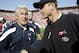Seattle Seahawks coach Pete Carroll, left, shakes hands with San Francisco 49ers coach Jim Harbaugh after an NFL football game in San Francisco, Sunday, Sept. 11, 2011. The 49ers won 33-17. (AP Photo/Paul Sakuma)