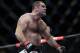 Gabriel Gonzaga, from Brazil, reacts after defeating Ben Rothwell, from the U.S, during their heavyweight mixed martial arts bout at the Ultimate Fighting Championship (UFC) in Sao Paulo, Brazil, Saturday, Jan. 19, 2013. (AP Photo/Andre Penner)