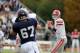 Cornell Big Red QB Jeff Mathews #9 in action against the Monmouth Hawks in their NCAA college football game in West Long Branch, NJ, Saturday, Oct. 19, 2013. Monmouth won 48-23. (AP Photo/Gregory Payan)