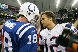 Hi-res-77678446-peyton-manning-of-the-indianapolis-colts-and-tom-brady_crop_north