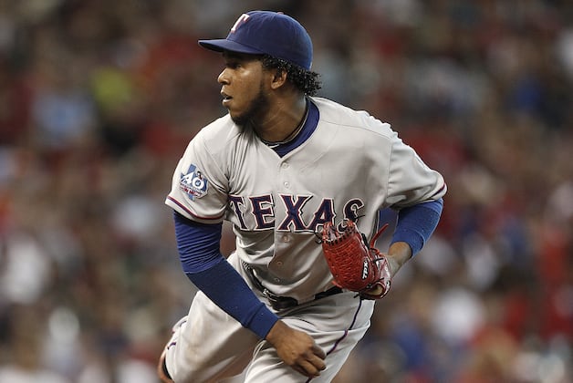 Rangers' Feliz, Ogando Avoid Arbitration