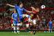MANCHESTER, ENGLAND - AUGUST 26: Oscar of Chelsea is challenged by Nemanja Vidic of Manchester United during the Barclays Premier League match between Manchester United and Chelsea at Old Trafford on August 26, 2013 in Manchester, England. (Photo by Alex Livesey/Getty Images)