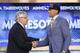 NBA Commissioner David Stern, left, shakes hands with Michigan's Trey Burke, who was selected by the Minnesota Timberwolves in the first round of the NBA basketball draft, Thursday, June 27, 2013, in New York. (AP Photo/Kathy Willens)