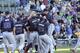 CHICAGO, IL - SEPTEMBER 22: The Atlanta Braves celebrate their division championship on September 22, 2013 at Wrigley Field in Chicago, Illinois. The Atlanta Braves defeated the Chicago Cubs 5-2 to clinch the National League East Championship. (Photo by David Banks/Getty Images)