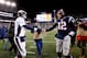FOXBORO, MA - NOVEMBER 24: Quarterback Peyton Manning #18 of the Denver Broncos and quarterback Tom Brady #12 of the New England Patriots shake hands after the New England Patriots defeated the Denver Broncos 34-31 in overtime at Gillette Stadium on November 24, 2013 in Foxboro, Massachusetts. (Photo by Jim Rogash/Getty Images)