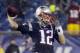 New England Patriots quarterback Tom Brady warms up before an AFC divisional NFL playoff football game against the Indianapolis Colts in Foxborough, Mass., Saturday, Jan. 11, 2014. (AP Photo/Matt Slocum)
