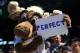 SEATTLE, WA - AUGUST 15: The Seattle Mariners moose mascot holds a sign after starting pitcher Felix Hernandez threw a perfect game against the Tampa Bay Rays at Safeco Field on August 15, 2012 in Seattle, Washington. (Photo by Otto Greule Jr/Getty Images)