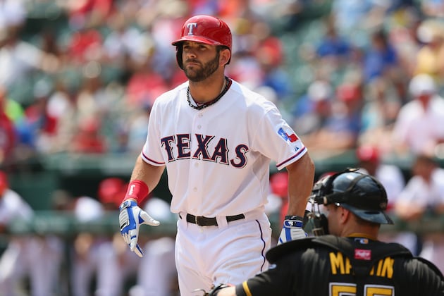 Rangers' Feliz, Ogando avoid arbitration