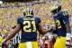 ANN ARBOR, MI - AUGUST 31: Devin Gardner #12 of the Michigan Wolverines celebrates a first quarter touchdown with Jeremy Gallon #21 while playing the Central Michigan Chippewas at Michigan Stadium on August 31, 2013 in Ann Arbor, Michigan. (Photo by Gregory Shamus/Getty Images)