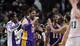 Los Angeles Lakers center Pau Gasol (16) celebrates with teammates after defeating the Boston Celtics 107-104 in an NBA basketball game in Boston, Friday, Jan. 17, 2014. Gasol had 24 points and 13 rebounds in the win. (AP Photo/Charles Krupa)