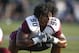 West Texas A&M defensive lineman Ethan Westbrooks (90) stretches during pre-game warmups before an NCAA football game against Tarleton State, Saturday, Oct. 12, 2013, in Stephenville, Texas. (AP Photo/Jim Cowsert)