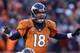 FILE - In this Jan. 12, 2014 file photo, Denver Broncos quarterback Peyton Manning calls an audible at the line of scrimmage against the San Diego Chargers in the second quarter of an NFL divisional playoff football game in Denver. Folks who watched the Broncos' NFL playoff win over the San Diego Chargers on television Sunday couldn't help but notice how often, and loudly, Manning used the code word