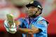 JOHANNESBURG, SOUTH AFRICA - DECEMBER 05: MS Dhoni of India pulls a delivery during the 1st Momentum ODI match between South Africa and India at Bidvest Wanderers Stadium on December 05, 2013 in Johannesburg, South Africa. The South Africa team are wearing a pink strip to improve breast cancer education and awareness across South Africa. (Photo by Duif du Toit/Gallo Images/Getty Images)