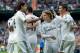 MADRID, SPAIN - NOVEMBER 09: Cristiano Ronaldo (R) of Real Madrid CF celebrates scoring their fifth goal with teammates Luka Modric (2ndR) and Sami Khedira (L) during the La Liga match between Real Madrid CF and Real Sociedad de Futbol at Estadio Santiago Bernabeu on November 9, 2013 in Madrid, Spain. (Photo by Gonzalo Arroyo Moreno/Getty Images)
