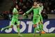 From left: Wolfsburg's Luiz Gustavo, scorer Bas Dost and Daniel Caligiuri celebrate a goal during the German Bundesliga soccer match between Borussia Moenchengladbach and VfL Wolfsburg at the Borussia Park in Moenchengladbach, Germany, Sunday Dec. 22, 2013. (AP Photo/dpa, Marius Becker)