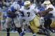 Notre Dame defensive lineman Stephon Tuitt, right, battles for position with Air Force offensive lineman Moshood Adeniji in the third quarter of Notre Dame's 45-20 victory in an NCAA football game at the Air Force Academy, Colo., on Saturday, Oct. 26, 2013. (AP Photo/David Zalubowski)