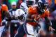 DENVER, CO - JANUARY 12: Montee Ball #28 of the Denver Broncos tries to avoid the tackle of Jarret Johnson #96 of the San Diego Chargers during the AFC Divisional Playoff Game at Sports Authority Field at Mile High on January 12, 2014 in Denver, Colorado. (Photo by Doug Pensinger/Getty Images)
