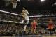 Indiana Pacers forward Paul George (24) dunks during an NBA basketball game between the Indiana Pacers and the Los Angeles Clippers in Indianapolis, Saturday, Jan. 18, 2014. The Pacers won 106-92. (AP Photo/AJ Mast)