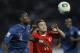 France's Kurt Zouma, left, and Turkey's Halil Akbunar keep their eyes on the ball during the Under-20 World Cup round of sixteen soccer match between Turkey and France in Gaziantep, Turkey, Tuesday, July 2, 2013. (AP Photo/Vadim Ghirda)