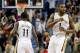 Dec 30, 2013; New Orleans, LA, USA; New Orleans Pelicans point guard Tyreke Evans (1) celebrates with teammate point guard Jrue Holiday (11) after hitting a shot to take the lead with 1.2 seconds remaining in the fourth quarter of a game against the Portland Trail Blazers at the New Orleans Arena. The Pelicans defeated the Trail Blazers 110-108. Mandatory Credit: Derick E. Hingle-USA TODAY Sports