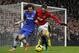 Chelsea's David Luiz, left, challenges Manchester United's Adnan Januzaj during their English Premier League soccer match at Stamford Bridge, London, Sunday, Jan. 19, 2014. (AP Photo/Sang Tan)