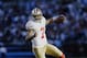San Francisco 49ers quarterback Colin Kaepernick (7) carries the ball against the Carolina Panthers during the second half of a divisional playoff NFL football game, Sunday, Jan. 12, 2014, in Charlotte, N.C. (AP Photo/Gerry Broome)