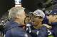 Seattle Seahawks head coach Pete Carroll celebrates with Seattle Seahawks' Russell Wilson after the second half of the NFL football NFC Championship game against the San Francisco 49ers Sunday, Jan. 19, 2014, in Seattle. The Seahawks won 23-17 to advance to Super Bowl XLVIII. (AP Photo/Ted S. Warren)