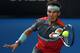 Rafael Nadal of Spain makes a forehand return to Kei Nishikori of Japan during their fourth round match at the Australian Open tennis championship in Melbourne, Australia, Monday, Jan. 20, 2014.(AP Photo/Aaron Favila)