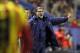 Barcelona's coach Gerardo Tata Martino from Argentina, gestures to the players during their La Liga soccer match against Levante at the Ciutat de Valencia stadium in Valencia, Spain, Sunday, Jan. 19, 2014. (AP Photo/Alberto Saiz)